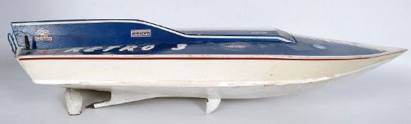 A fuel powered `Retro 3` power racing model radio controlled boat, with part radio gear. In blue