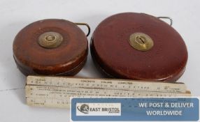 Two vintage engineer tape measures - one by Rabone & Sons. The other by Chesterton. Along with a
