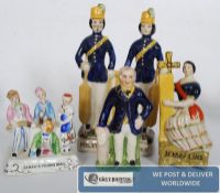 A collection of flatback Staffordshire figurines including Gladstone etc