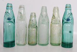 A collection of 19th century Victorian and later Codd neck glass marble bottles. To include P Dowd