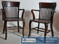 2 1930`s Art Deco / Industrial solid oak office chairs. Shaped legs united by stretchers having
