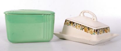 A green 1950`s Royal Doulton butter dish (No. 8323) together with an Ivory Ware cheese dish.