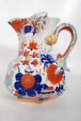 A 19thC Masons large ironstone hydra type octagonal jug decorated in Imari colours, 25cm high