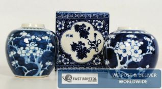 A Chinese blue & white pillow, along with a pair of blue and white pots.