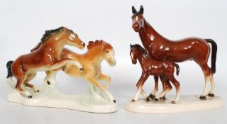 A pair of china horse duets, both Beswick style, being stamped to bottom `2237` 20cm tall.