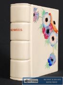 A Clarice Cliff Anemone vase in the form of a book bind. Entitled Memories to the binding. 7`` High
