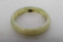 A green jade bangle.