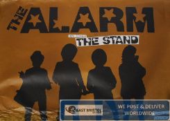 Music Memorabilia. An unframed large `Alarm`  `The Stand` music album poster depicting silhouette