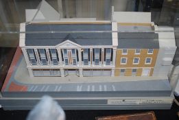 An architects model of a new development entitled 11 High Street, showing a new Clarks Shoes