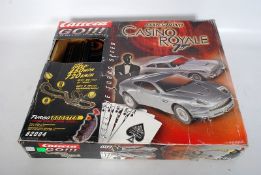 Scalextric style Carrera Go! James Bond car racing Casino Royale set.