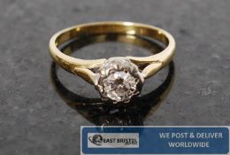 A ladies 18ct gold & diamond solitaire ring. The diamond approximately 25 pts being set within claw