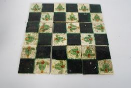 A collection of 9 Art Nouveau wall tiles