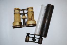An etched glass measuring tube, in original leather case along with a pair of bone covered opera