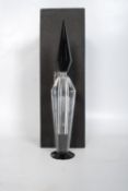 A 1930`s Art Deco style cut glass perfume bottle. The decorative tapering clear glass stem with