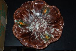 A Majollica style fruit dish with drip glaze pattern, with markings to base.