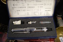 A vintage medical Schuco injector, in original case with instructions.