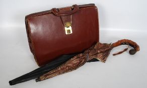 A good quality leather gentlemans attache case together with 2 vintage ladies parasols / umbrella`s