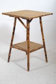 A Victorian bamboo occasional table having 2 rattan weave tiers to each. 55cms high x 43cms Wide x