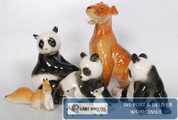 A collection of 7 Russian USSR animal model figurines.