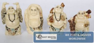 A set of 4 Chinese resin figurines being chased and having Chinese markings to the underside.