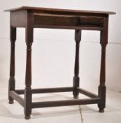 An 18th century country oak peg jointed Georgian occasional table. Turned legs united by stretchers
