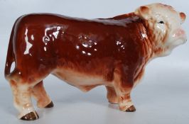 A Melba Ware ceramic farm bullock animal. 27cm long.