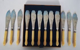 A set of 12 EPNS Mappin & Webb fish knives having decorative blades and finished handles to each.