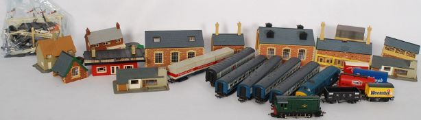 A quantity of Hornby locomotives, tenders, buildings, track etc. Along with other train set parts.