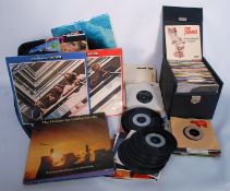 A large collection of 70's and 80's singles to include Bob Marley, The Kinks, and many more plus a