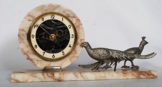 An Art Deco marble cased mantel clock on plinth with decorative silver plated peacock birds. 20cm