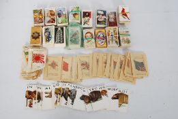 A collection of Kensitas silk cigarette cards ' Flags of the World ' together with a collection of