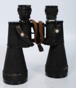 A pair of Lieberman & Gortz binoculars complete in leather in case. Coated lenses 12 x 50. 18cms