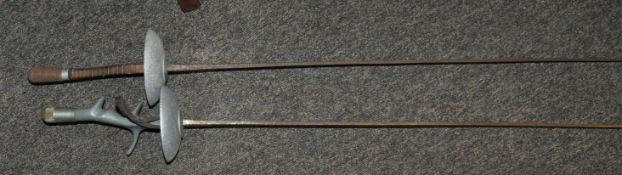 Two fencing sport foil swords. One by Paul, the other unnamed. 106cm long.