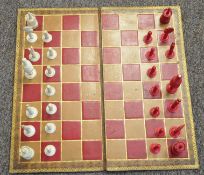 An ivory chess set 19th century and leather chess board. Missing 2 kings. queen 8cm.