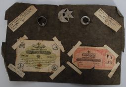 An unusual collection of WW1 prisoner of war souvenirs to include bank notes, rings made from bottle