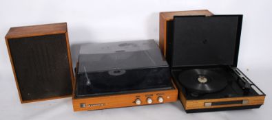A portable Fidelity record player along with an Elizibethan record player and speakers.
