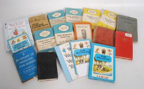 A collection of vintage 20th century books to include Pelican softbacks, AA Milne, Beowolf, local