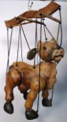 A hand craved Teak puppet in the form of a cow. In full working order. no faults or repairs.