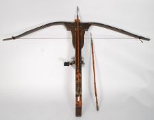 A vintage fishing / hunting crossbow complete with arrows etc