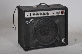 A 1970's Pro Amp Demon amplifier having carry handle atp, celestion speakers to inside