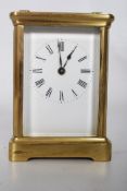 A 19th Century French Brass timepiece carriage clock having enamel face with roman numerals set