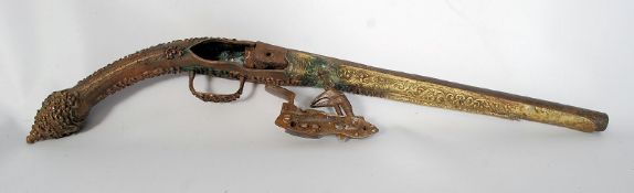 An Albanian or Balkans ornate metal pistol stock and miquelet Flintlock.
