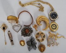 A collection of ladies jewellery, brooches, hair pins, pocket watches copper band and others.