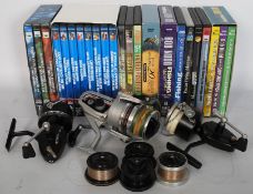 An assortment of fishing reels including Daiwa & Mitchell (plus spare spools) along with a