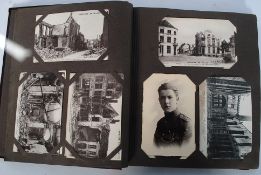 A postcard album with early 20th century postcards / photographs, some military army WWI interest,