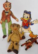 A vintage hand stitched teddy bear with boxed string puppet dog and 2 disney paper puppets, 1