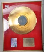 A framed and glazed gold record of Simply Red Stars. Presented to Catherine Aylesbury, a Go For Gold