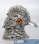 A detailed silver plated inkwell in the form of a bird head. Hinged neck revealing interior, with