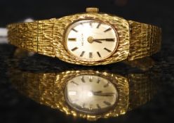 A ladies gold plated evening watch by Helvita