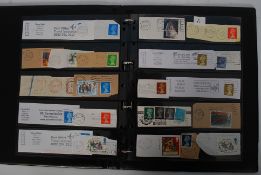 An album of assorted stamps and British postmarks / franking marks.